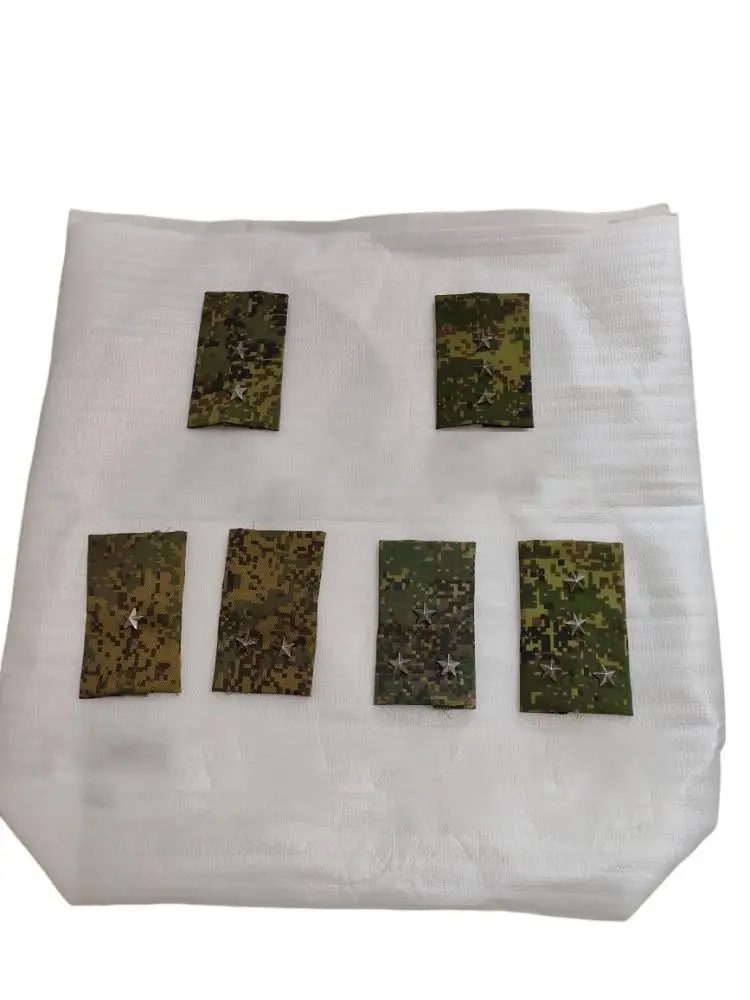 Epaulettes camuflaje digital con estrellas metálicas