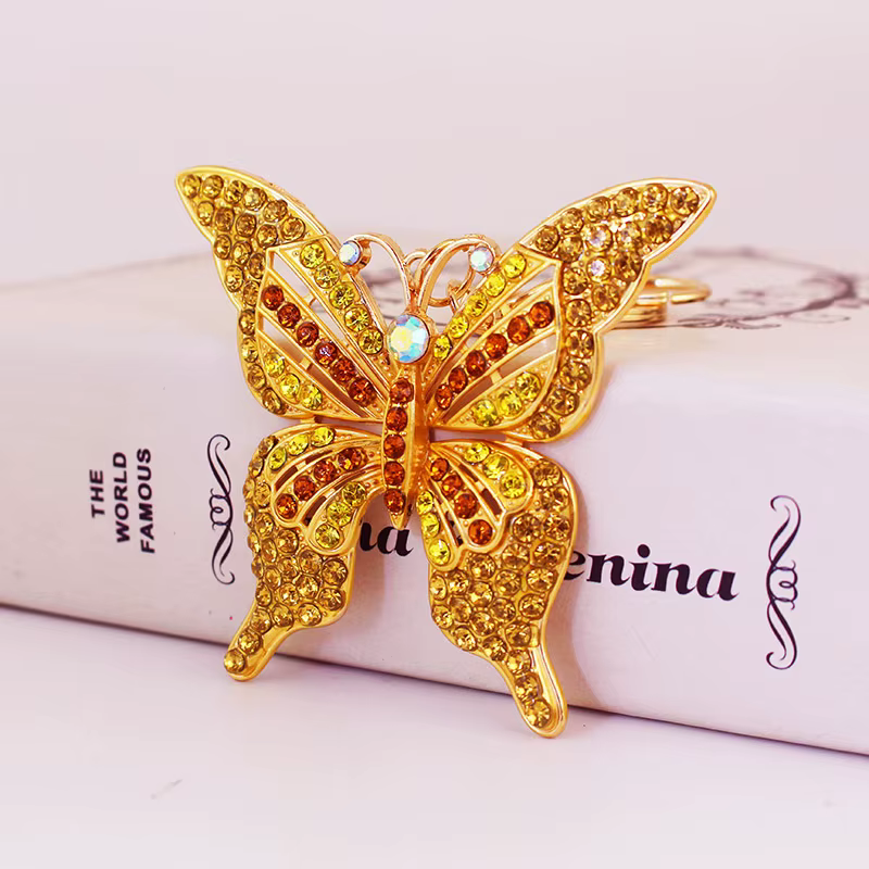 Llavero mariposa con pedrería multicolor para bolso - imagen 2