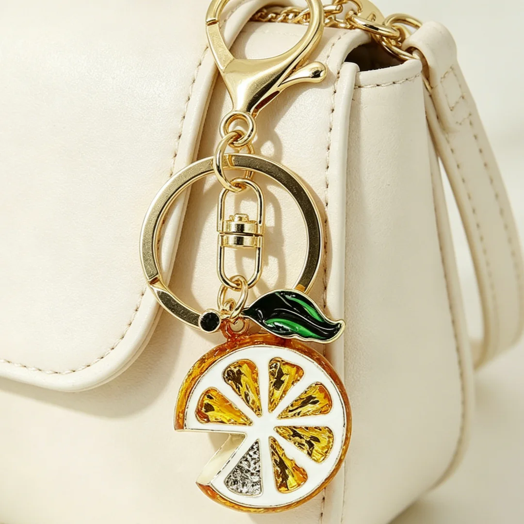 Llavero con forma de limón y diamantes de imitación