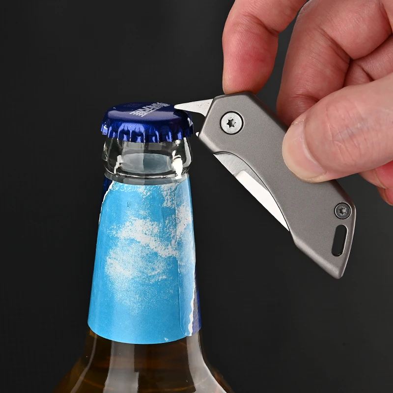 Cuchillo plegable táctico Titanio D2 de alta dureza con llavero - imagen 2