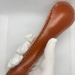 Clapper cuero para defensa con bloque de plomo cosido a mano sólido