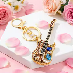Llavero musical de guitarra con cristales para bolso o coche