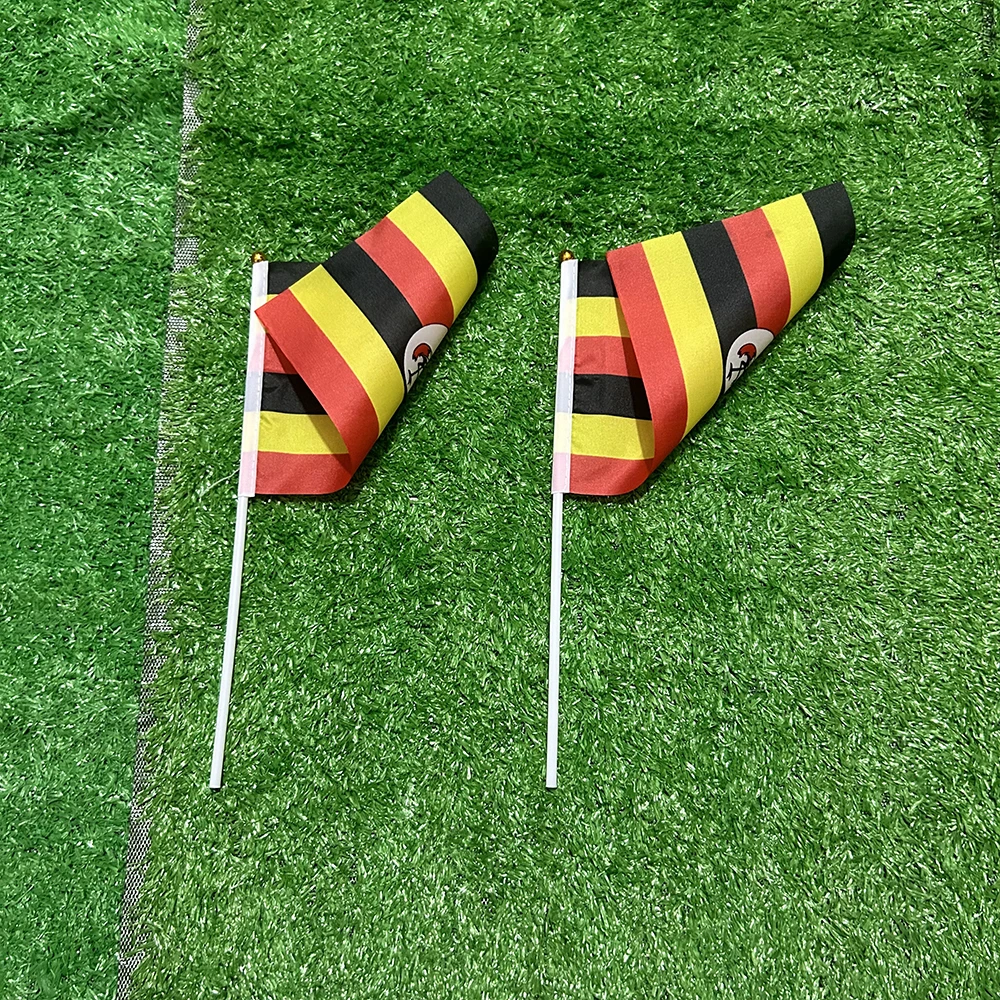 Bandera de Uganda mano en poliéster con asta plástica - imagen 2