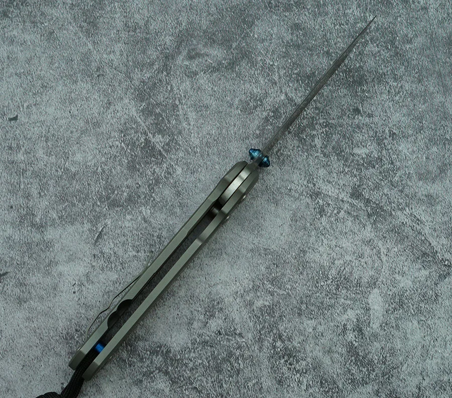 Sakura Cuchillo plegable EDC hoja de acero y mango titanio - imagen 3