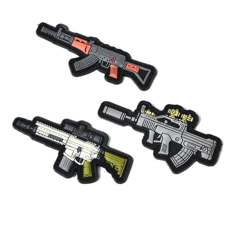 Parches con temática de pistolas y estilos de dibujo