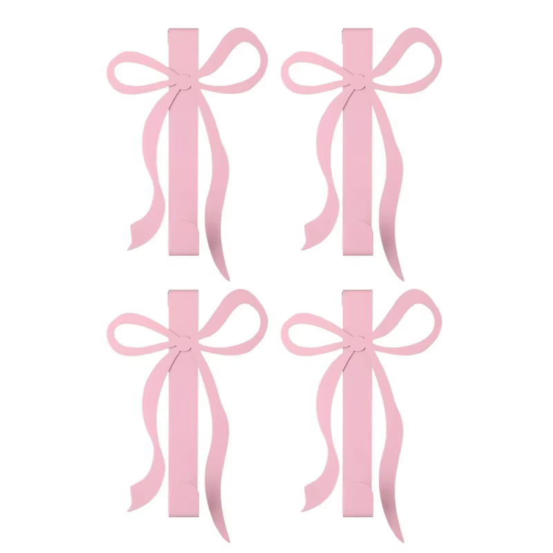 Ganchos con lazo rosa en puerta