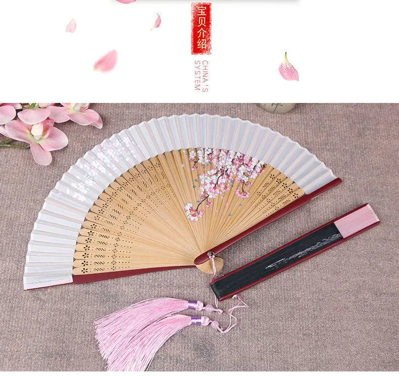 Abanico plegado con estilo antiguo y flecos