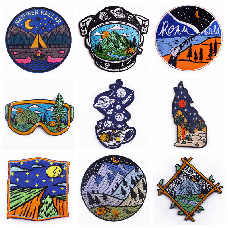 Parches bordados con paisaje de montaña